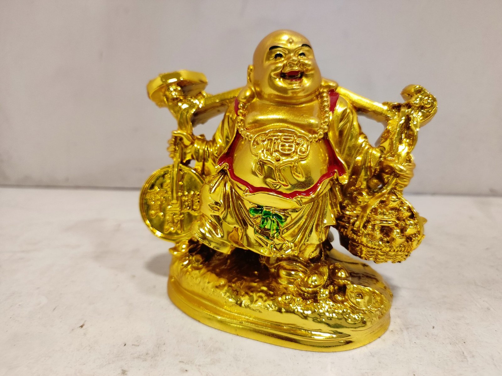 Laughing buddha fengshui golden
