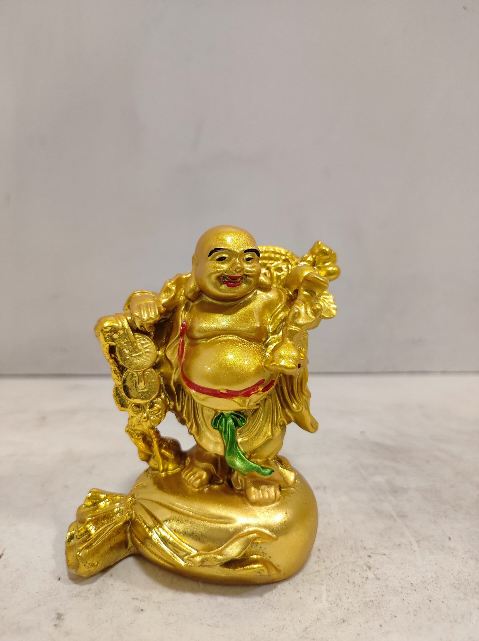 Fengshui golden laughing buddha on sack - Image 1