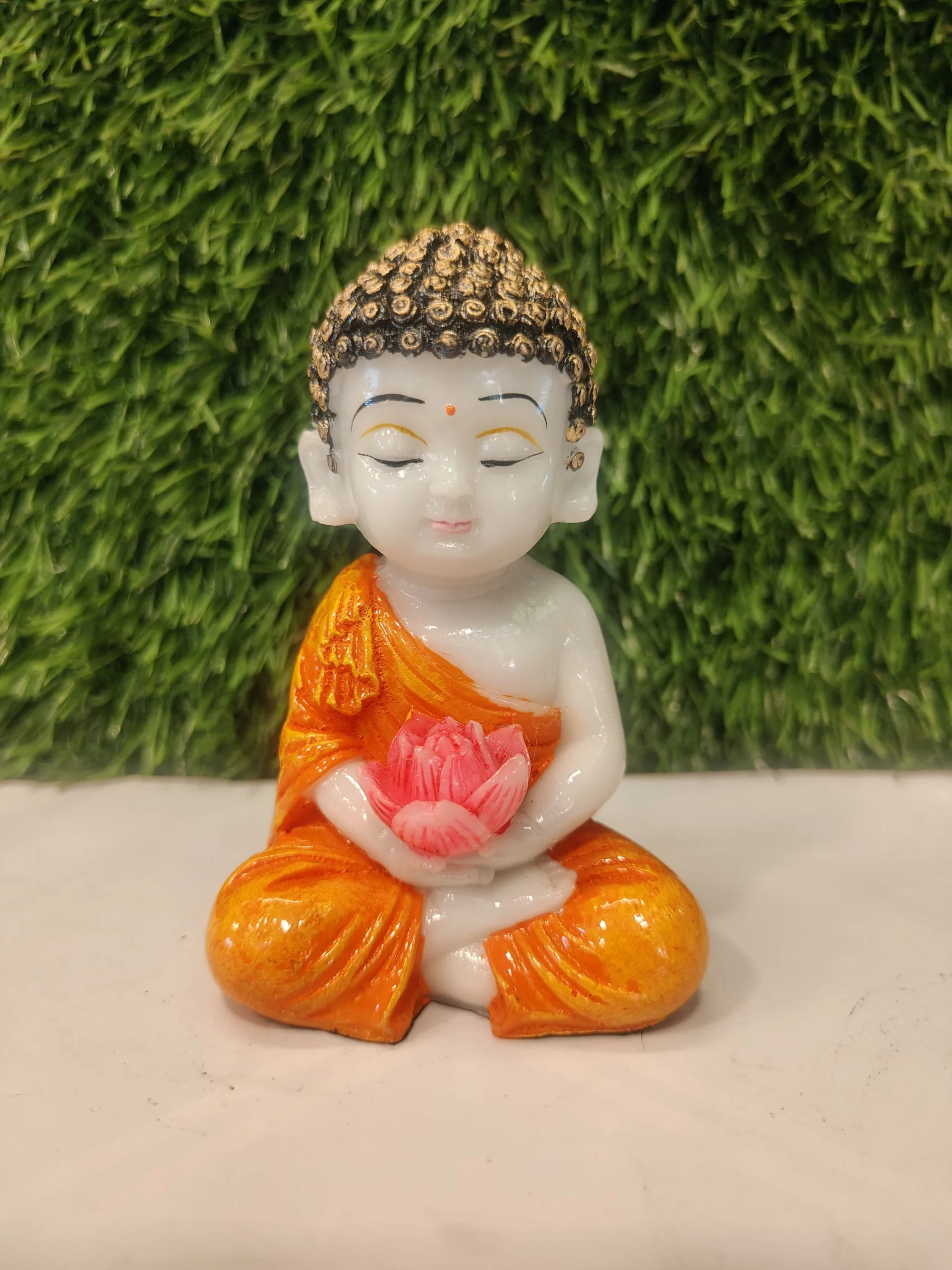 Flower Holding Baby Monk Figurine – Orange & White | 4.5 Inch - Image 2
