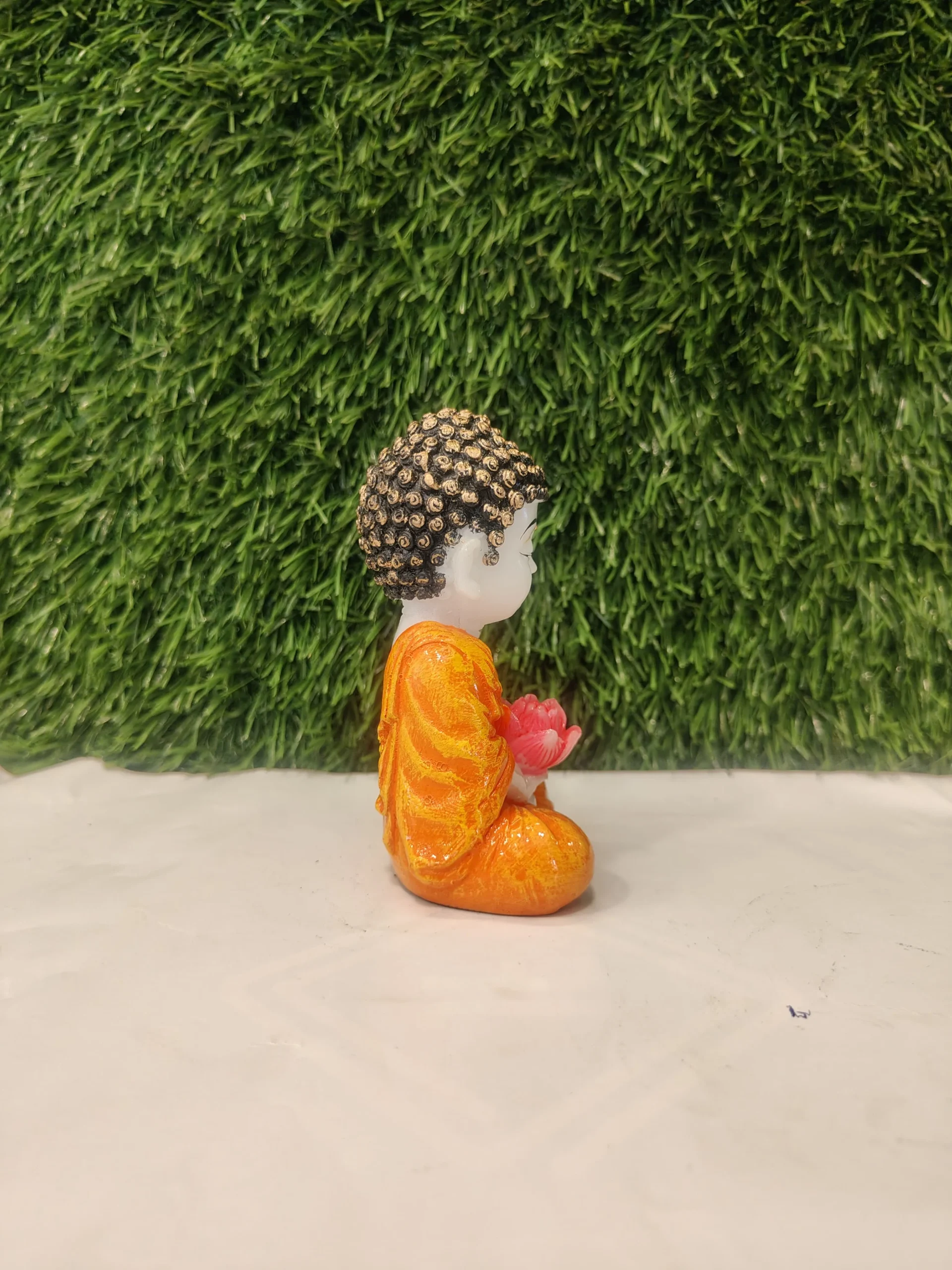 Flower Holding Baby Monk Figurine – Orange & White | 4.5 Inch - Image 4